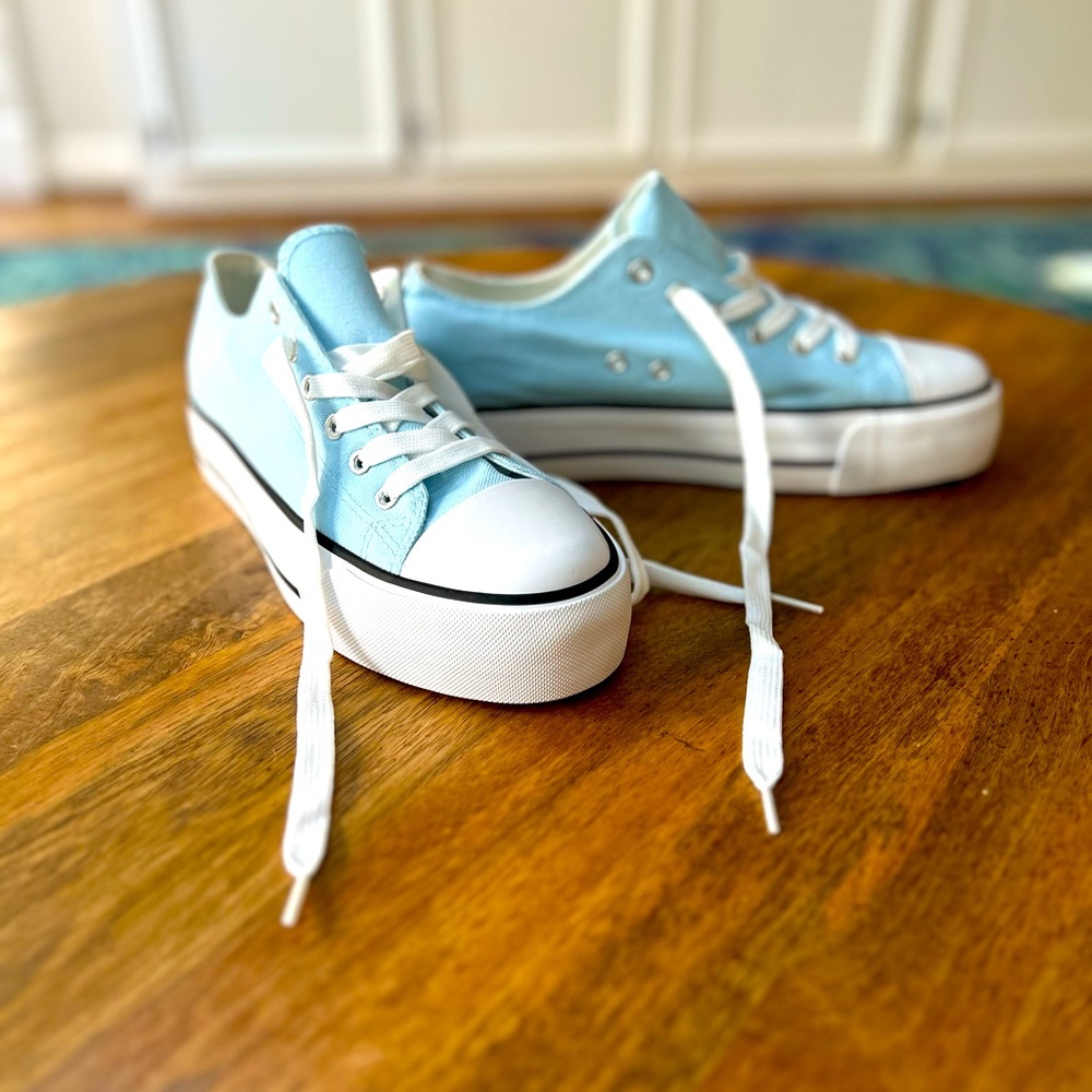 Boutique baby blue platform sneakers. Never been worn- without tags.